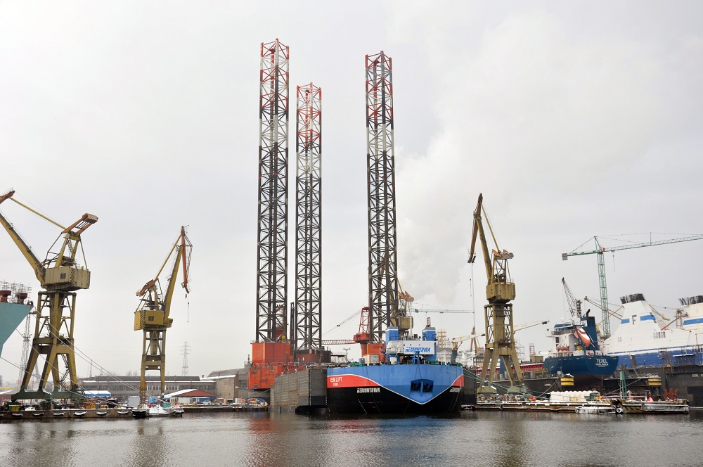 Petrobaltic offshore rig docked on board a heavy lift vessel