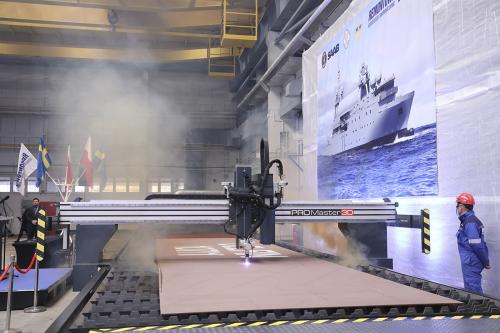 Sheet cutting ceremony for the construction of the first in a series of SIGINT-type ships